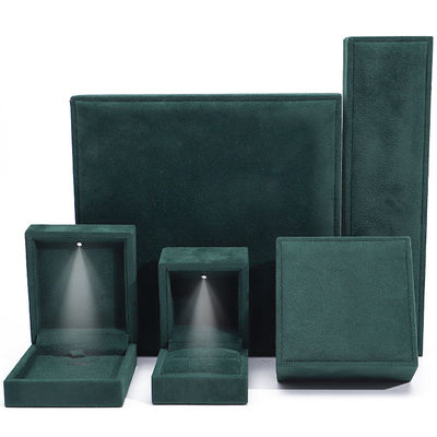 Caja de embalaje de joyas de lujo de color verde oscuro con luz LED brillante