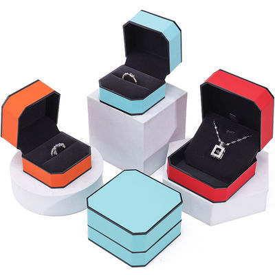 comprar Caja de embalaje de joyería de cuero PU de borde negro octogonal elegante para almacenamiento de lujo online manufacture