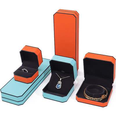 Caja de embalaje de joyería de cuero PU de borde negro octogonal elegante para almacenamiento de lujo
