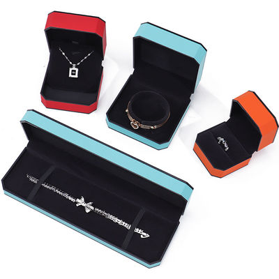 Caja de embalaje de joyería de cuero PU de borde negro octogonal elegante para almacenamiento de lujo