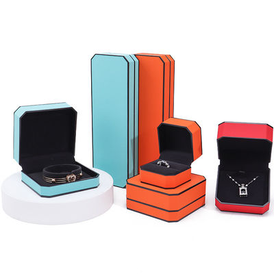 Caja de embalaje de joyería de cuero PU de borde negro octogonal elegante para almacenamiento de lujo