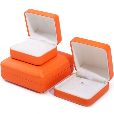 Logotipo personalizado Rectángulo naranja caja de joyería de cuero para lujo brazalete collar de almacenamiento