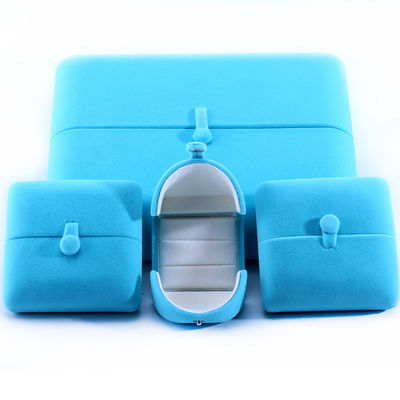 Elegante joyero de doble puerta, joyero de terciopelo azul de alta gama con logotipo