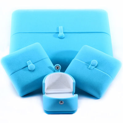 Elegante joyero de doble puerta, joyero de terciopelo azul de alta gama con logotipo
