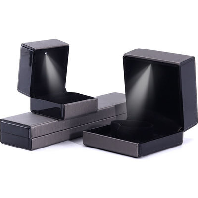 Caja de embalaje de joyas de luz LED de Hanhong Custom Logotipo en gris para collar y anillo de pulsera