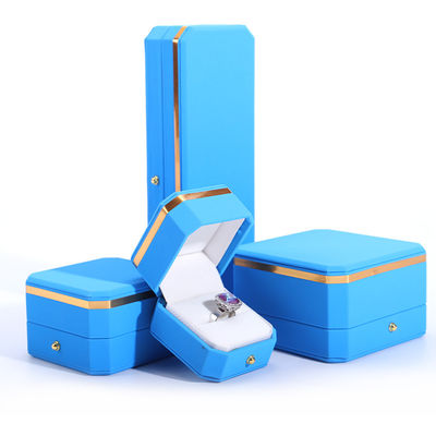 comprar Caja de joyería de envoltura de regalo de cuero PU azul para el logotipo personalizado de botón de metal octogonal de Hanhong online manufacture