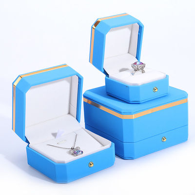 Caja de joyería de envoltura de regalo de cuero PU azul para el logotipo personalizado de botón de metal octogonal de Hanhong