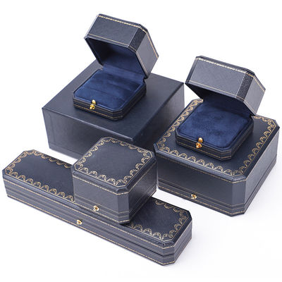 Logotipo personalizado paquete de joyas hecha a mano caja de papel cuadrada azul para lujo caja de anillo de plástico