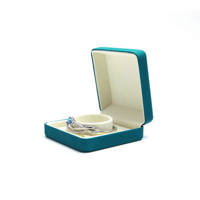 Logotipo del cliente Terciopelo de hierro Caja de joyas azul Hanhong para el embalaje de brazaletes de collar