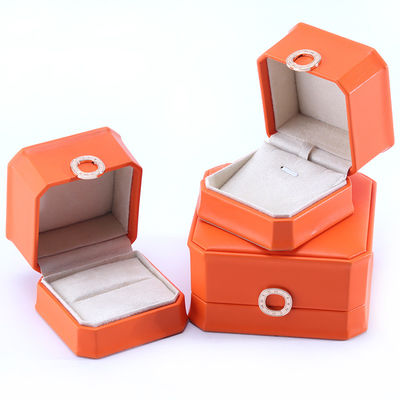 Caja de embalaje de joyas de cuero PU de color naranja cuadrado para brazalete de collar y anillo de bodas