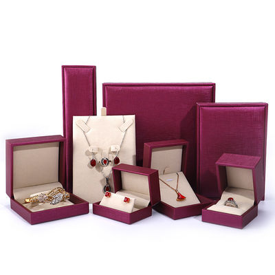 comprar China fabricación mayorista de joyería de lujo Envasado en caja de alta gama personalizada collar brazalete arete anillo de oreja Envasado rosa Rojo Pu caja de joyería de cuero con logotipo online manufacture