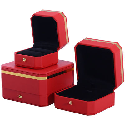 Caja de embalaje de lujo de cuero PU octogonal rojo con adornos dorados