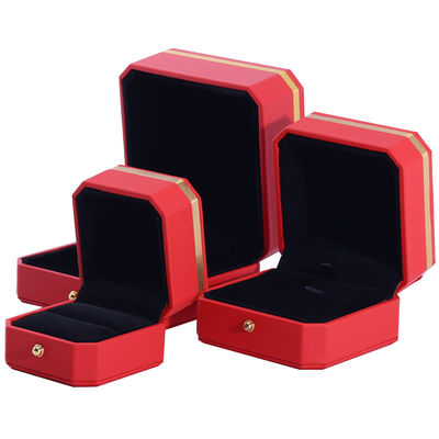 Caja de embalaje de lujo de cuero PU octogonal rojo con adornos dorados