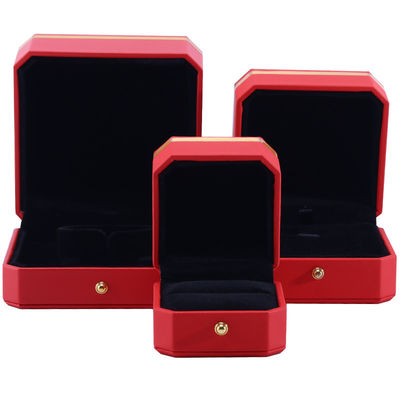 Caja de embalaje de lujo de cuero PU octogonal rojo con adornos dorados