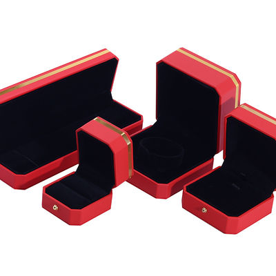 Caja de embalaje de lujo de cuero PU octogonal rojo con adornos dorados