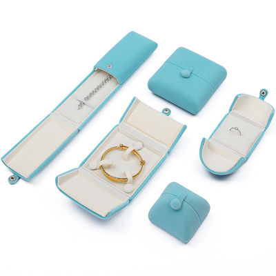 Caja de embalaje de joyas de terciopelo suave y elegante de color cian
