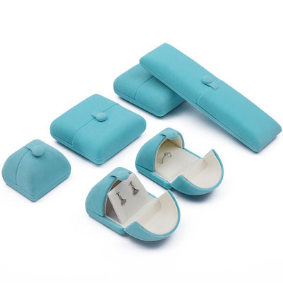 Caja de embalaje de joyas de terciopelo suave y elegante de color cian