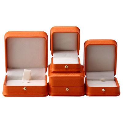 Caja de joyería de cuero PU de grano de nieve naranja noble para embalaje de almacenamiento de lujo