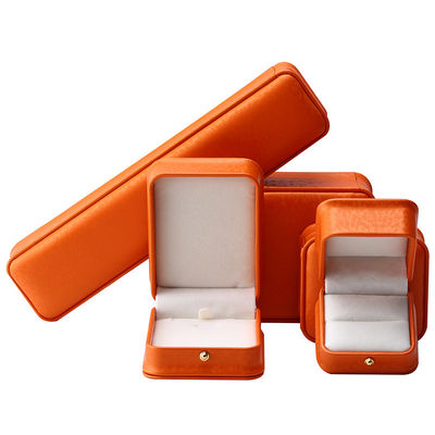 Caja de joyería de cuero PU de grano de nieve naranja noble para embalaje de almacenamiento de lujo
