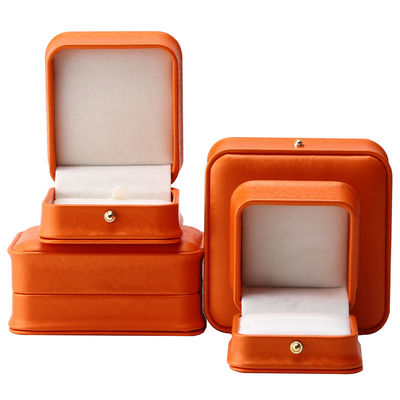 Caja de joyería de cuero PU de grano de nieve naranja noble para embalaje de almacenamiento de lujo