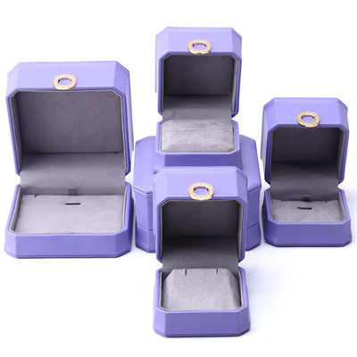 Cautivante púrpura octogonal caja de joyería de cuero PU para anillo de orejas colgante