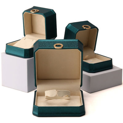 Caja de embalaje de joyas de cuero PU octogonal de color verde oscuro con ornamento de anillo