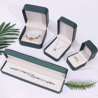 Caja de almacenamiento de joyas de cuero falso convexo verde oscuro Embalaje organizador de lujo