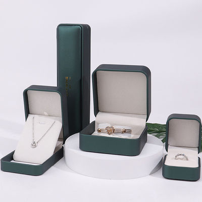 Caja de almacenamiento de joyas de cuero falso convexo verde oscuro Embalaje organizador de lujo