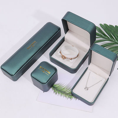Caja de almacenamiento de joyas de cuero falso convexo verde oscuro Embalaje organizador de lujo