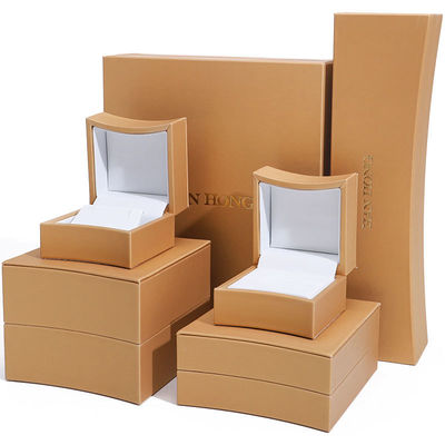 comprar Caja de joyería en forma de arco dorado de cuero falso caja de joyería de lujo caja de embalaje de almacenamiento online manufacture
