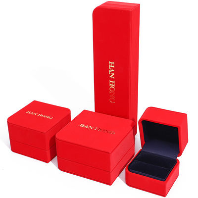 comprar Caja de joyería de cuero de PU en forma de diamante de arco rojo revestimiento de terciopelo para envases de lujo online manufacture