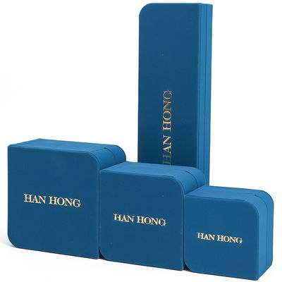 Caja de almacenamiento de joyas de cuero en forma de arco de diamante de PU para el embalaje de colgantes de anillos