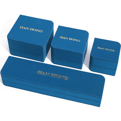 Caja de almacenamiento de joyas de cuero en forma de arco de diamante de PU para el embalaje de colgantes de anillos