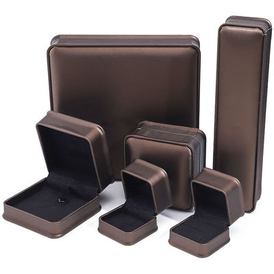 comprar Caja de joyería de cuero de PU en forma de arco de café para el embalaje de anillos de oreja colgante online manufacture
