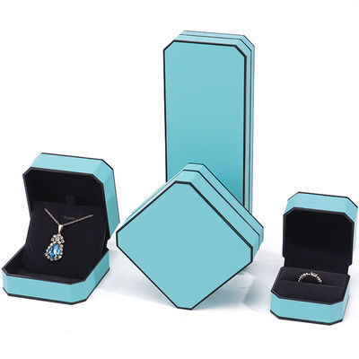 comprar Cyan Elegante Octagonal Falsa de Piel de joyería caja de paquete con ornamentación de borde negro online manufacture
