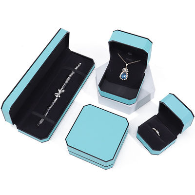 Cyan Elegante Octagonal Falsa de Piel de joyería caja de paquete con ornamentación de borde negro