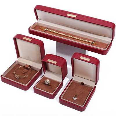 comprar Efecto flotante de cuero PU rojo de lujo de joyería de embalaje de la caja con barra de oro online manufacture