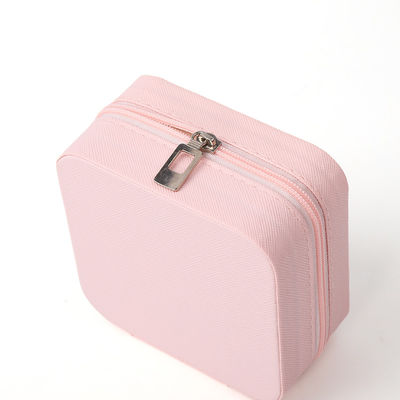 Caja de almacenamiento de joyas portátil pequeña de cuero Pu con cuentas de terciopelo rosa