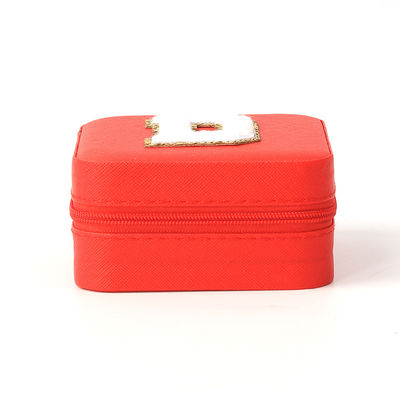 Caja de almacenamiento de joyas rojas de cuero pequeño portátil