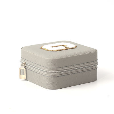 Pequeño organizador de joyas de cuero gris caja de almacenamiento de joyas de viaje