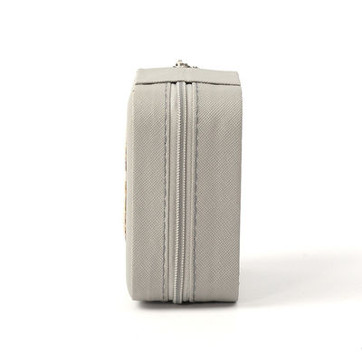 Pequeño organizador de joyas de cuero gris caja de almacenamiento de joyas de viaje
