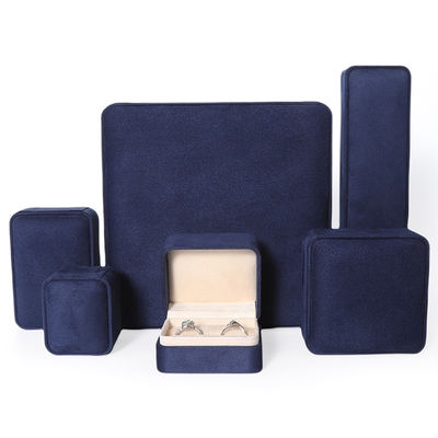 Caja de embalaje de joyería azul premium al por mayor de fabricación china, caja de embalaje personalizada de alta gama para conjuntos de joyería grandes, collar, pulsera, pendientes, anillo, embalaje cuadrado hecho a mano de terciopelo azul, caja de joyería con logotipo