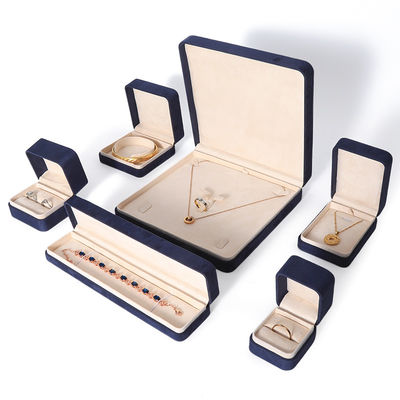 Caja de embalaje de joyería azul premium al por mayor de fabricación china, caja de embalaje personalizada de alta gama para conjuntos de joyería grandes, collar, pulsera, pendientes, anillo, embalaje cuadrado hecho a mano de terciopelo azul, caja de joyería con logotipo