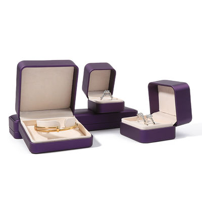 Caja de embalaje de joyería de alta calidad de lujo personalizado conjunto de joyas grandes caja collar brazalete aretes anillo embalaje hecha a mano cuadrada de piel púrpura caja de joyas con logotipo
