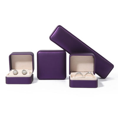 Caja de embalaje de joyería de alta calidad de lujo personalizado conjunto de joyas grandes caja collar brazalete aretes anillo embalaje hecha a mano cuadrada de piel púrpura caja de joyas con logotipo