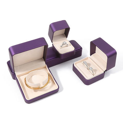 Caja de embalaje de joyería de alta calidad de lujo personalizado conjunto de joyas grandes caja collar brazalete aretes anillo embalaje hecha a mano cuadrada de piel púrpura caja de joyas con logotipo