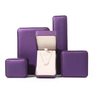 Caja de embalaje de joyería de alta calidad de lujo personalizado conjunto de joyas grandes caja collar brazalete aretes anillo embalaje hecha a mano cuadrada de piel púrpura caja de joyas con logotipo