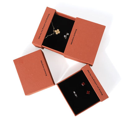 China fabricación al por mayor de alta calidad Caja de collar, pendientes, pulsera y anillo. Embalaje de joyería personalizado, ecológico, de cartón, papel, naranja, caja de joyería con cajón y logotipo.