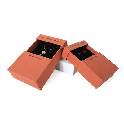 China fabricación al por mayor de alta calidad Caja de collar, pendientes, pulsera y anillo. Embalaje de joyería personalizado, ecológico, de cartón, papel, naranja, caja de joyería con cajón y logotipo.