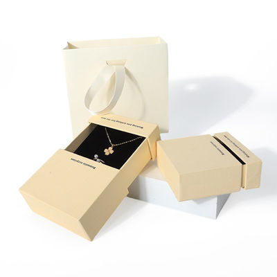 China fabricación al por mayor de alta calidad collar Orecillos Brazalete caja de anillos embalaje de joyas personalizado personalizado cartón ecológico Papel cartón amarillo cajón caja de joyas con logotipo